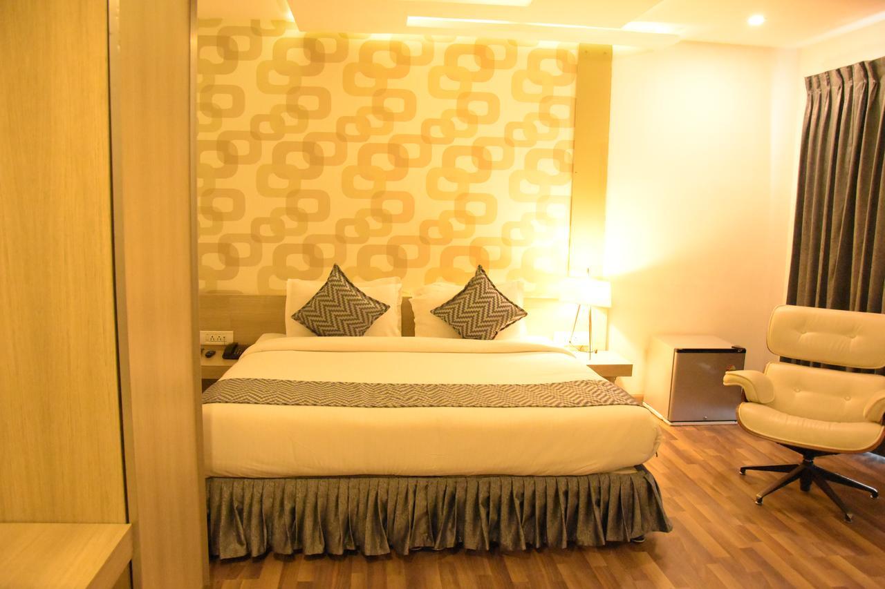 Poppys Tower Hotel Коимбаторе Екстериор снимка
