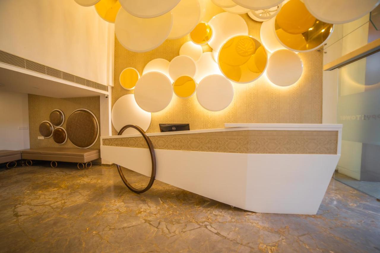 Poppys Tower Hotel Коимбаторе Екстериор снимка